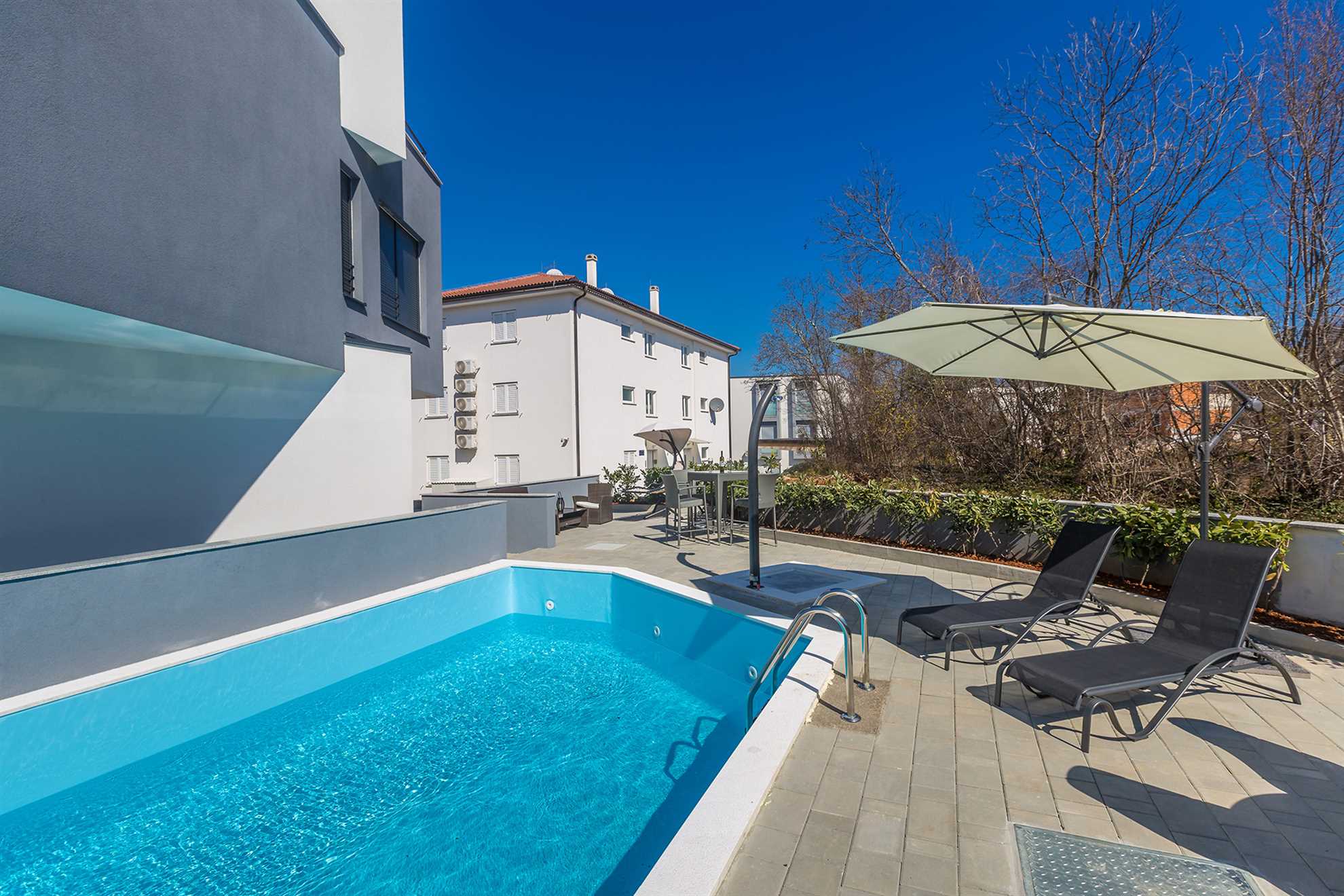 Apartman LAGANINI II sa zajedničkim bazenom