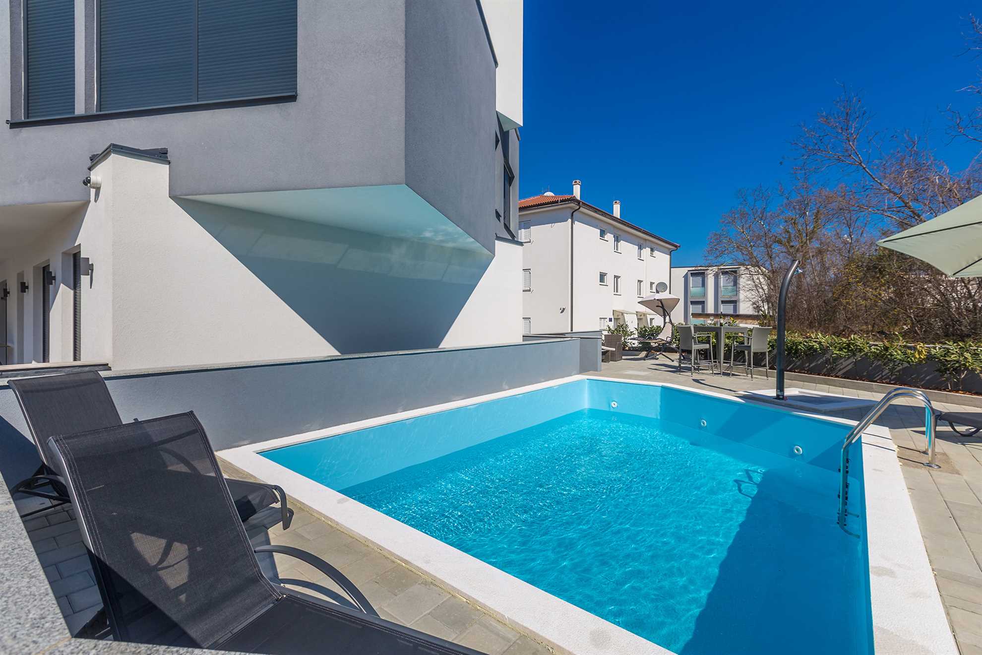 Apartman LAGANINI II sa zajedničkim bazenom