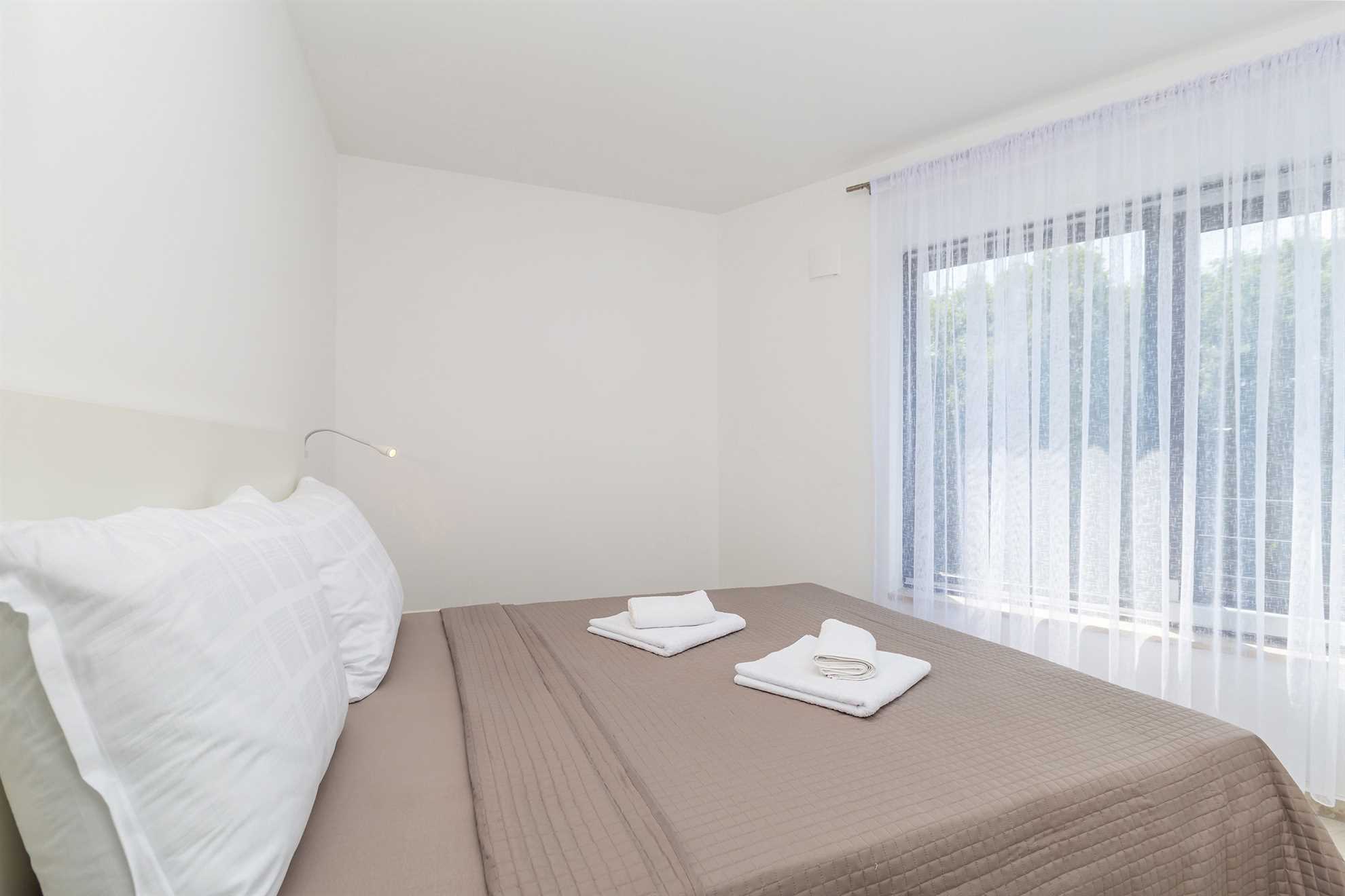 Apartman LAGANINI II sa zajedničkim bazenom