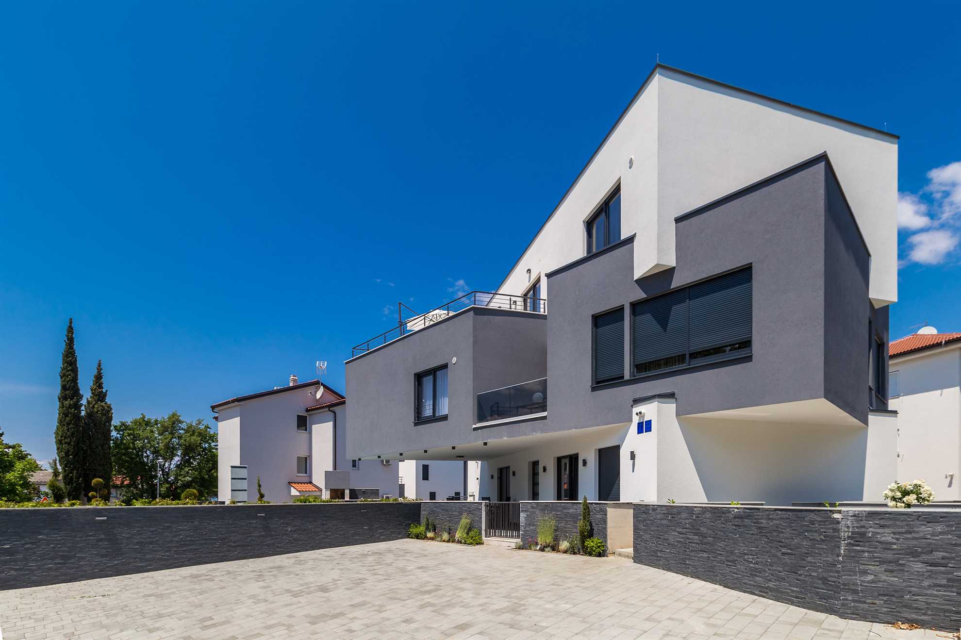 Apartman LAGANINI II sa zajedničkim bazenom