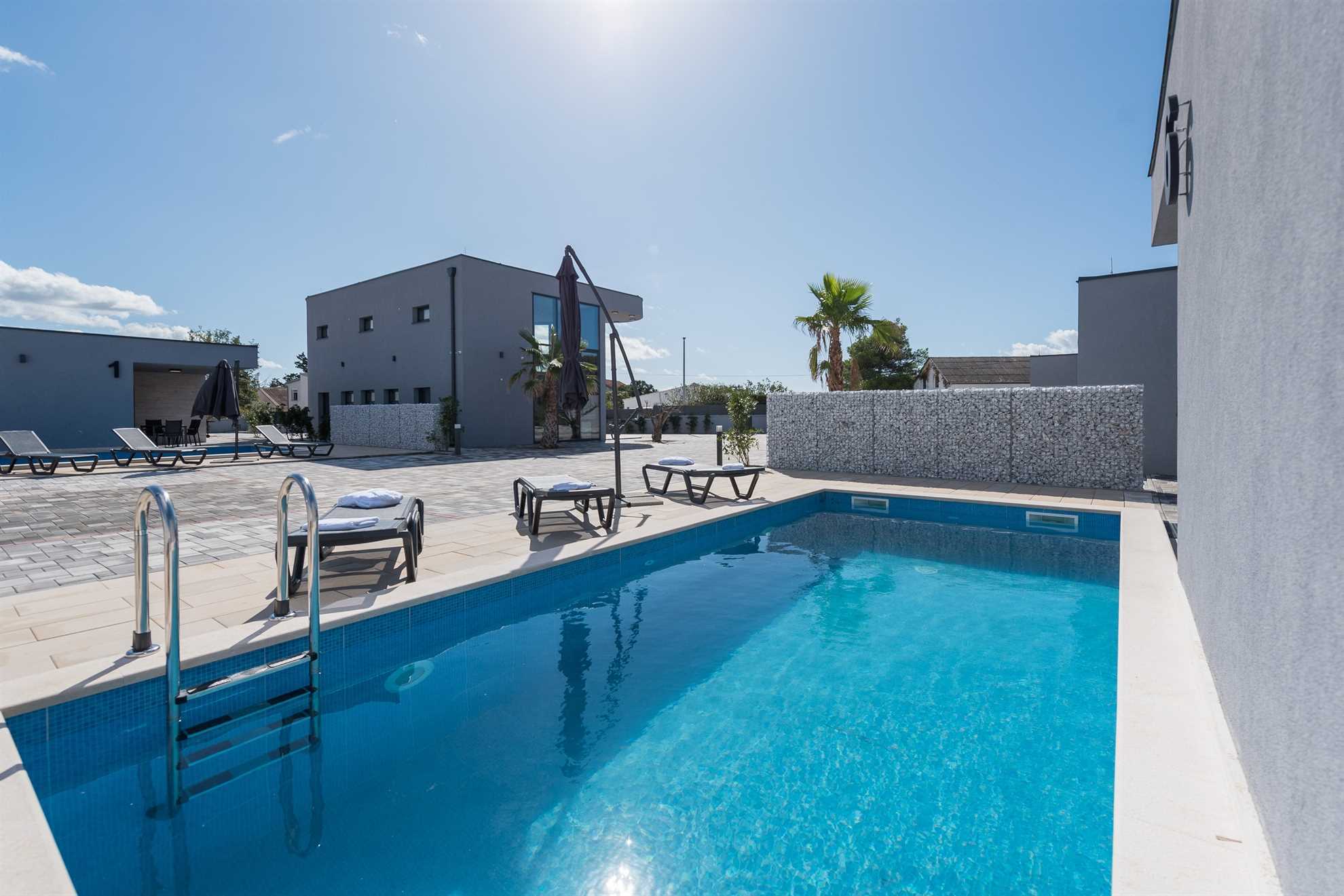 Family holiday home with pool for 4-6 pers in a luxury resort